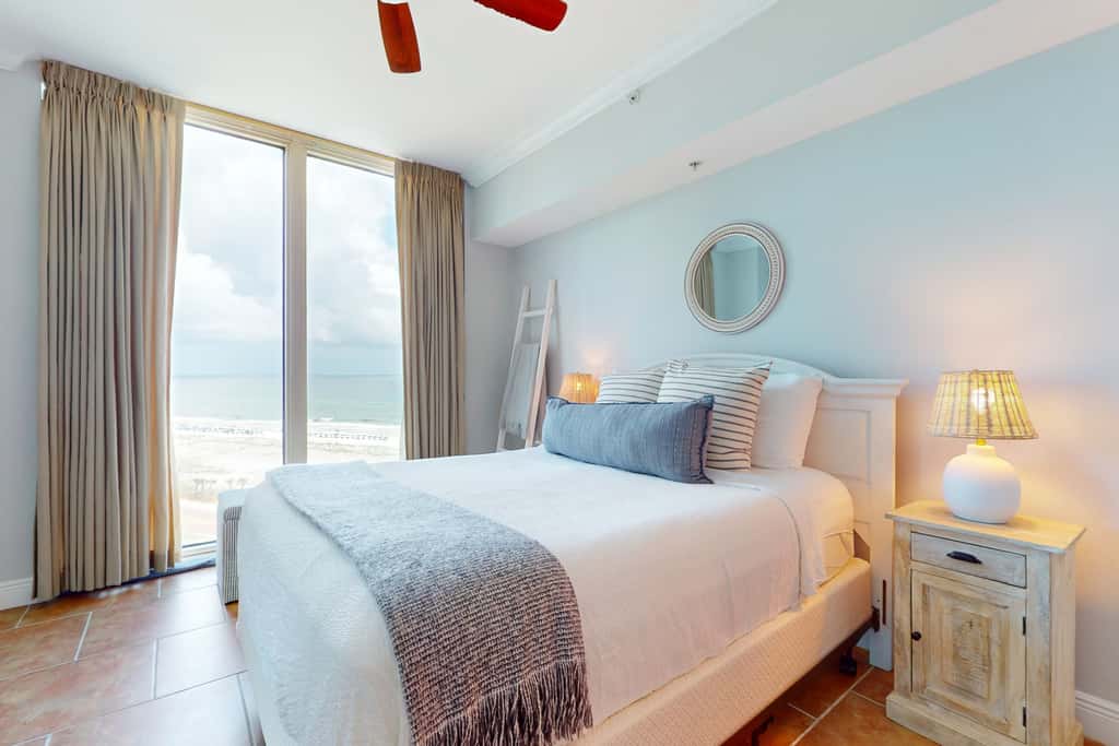 Gulf-view condo with pool, hot tub, beach access, tennis, balcony, AC, & W/D