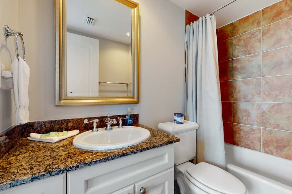 Gulf-view condo with pool, hot tub, beach access, tennis, balcony, AC, & W/D