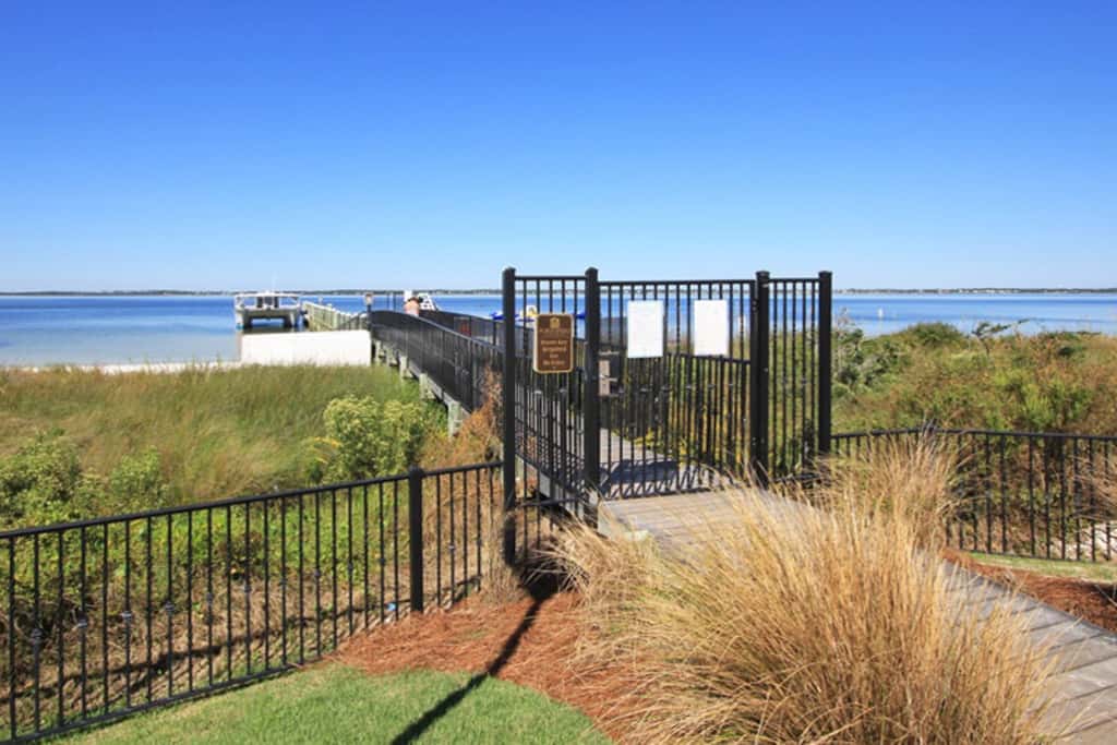 Gulf-view condo with pool, hot tub, beach access, tennis, balcony, AC, & W/D