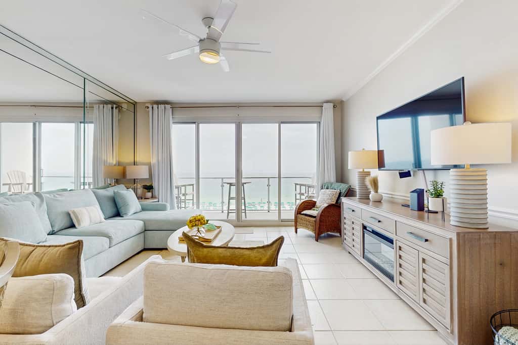 Stunning waterfront home with convenient beach access, pool & gym