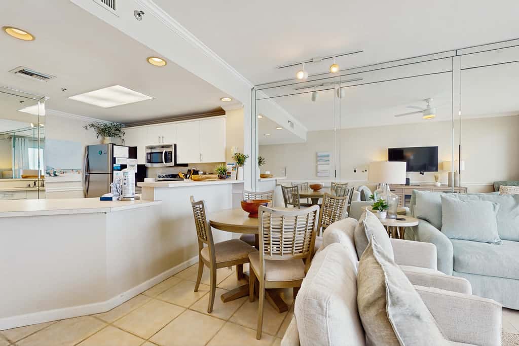 Stunning waterfront home with convenient beach access, pool & gym