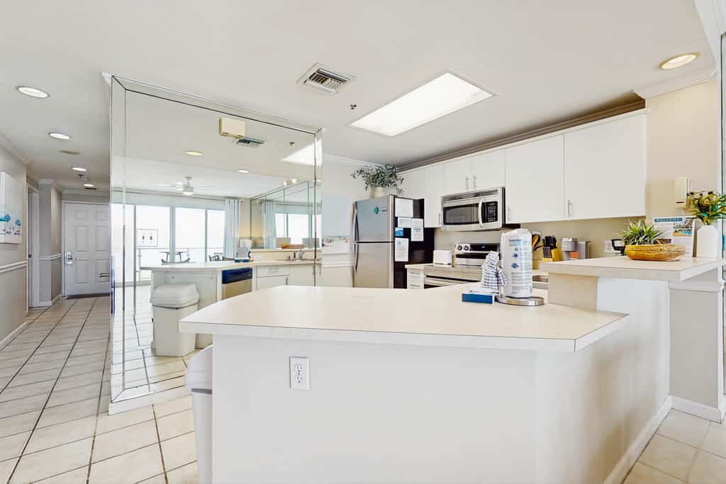 Stunning waterfront home with convenient beach access, pool & gym