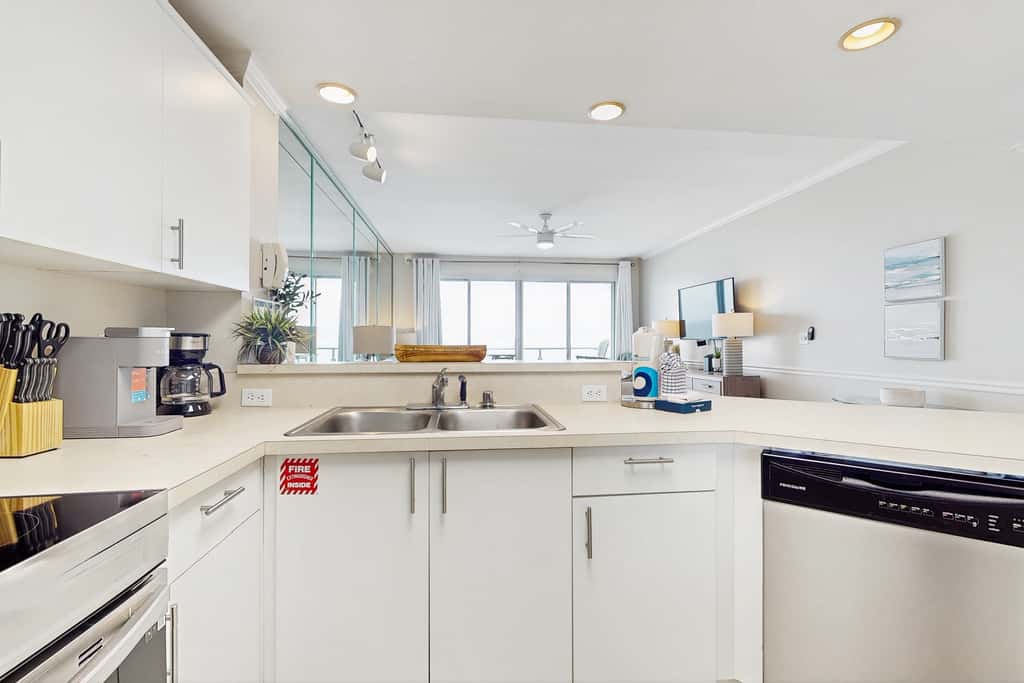 Stunning waterfront home with convenient beach access, pool & gym