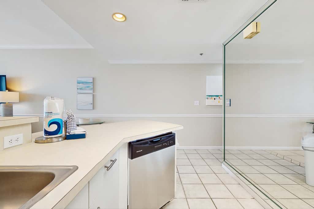 Stunning waterfront home with convenient beach access, pool & gym