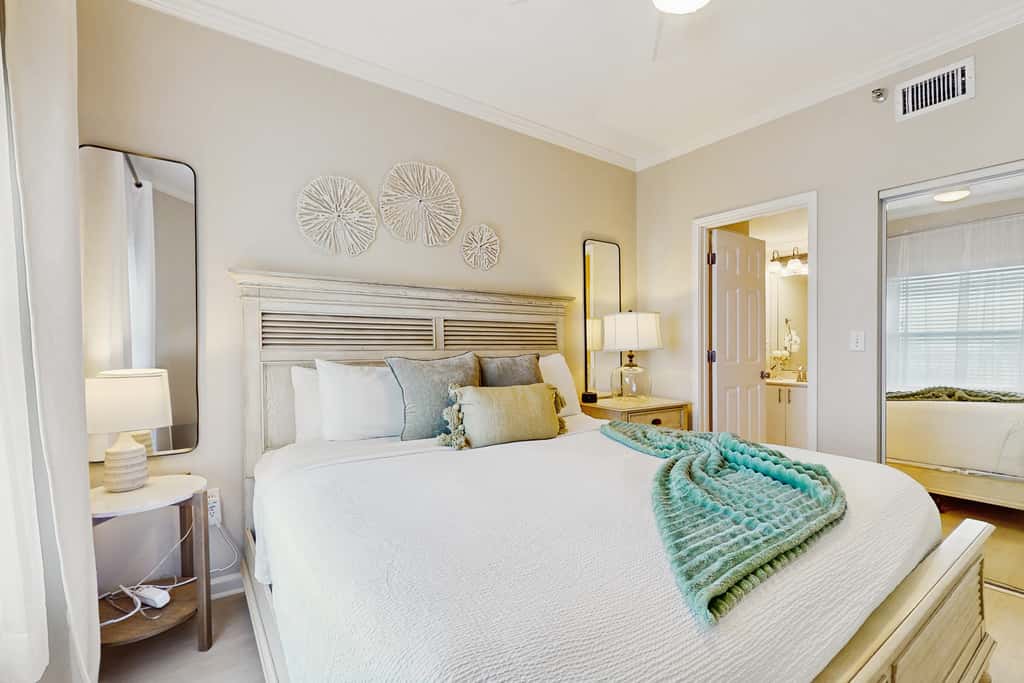 Stunning waterfront home with convenient beach access, pool & gym