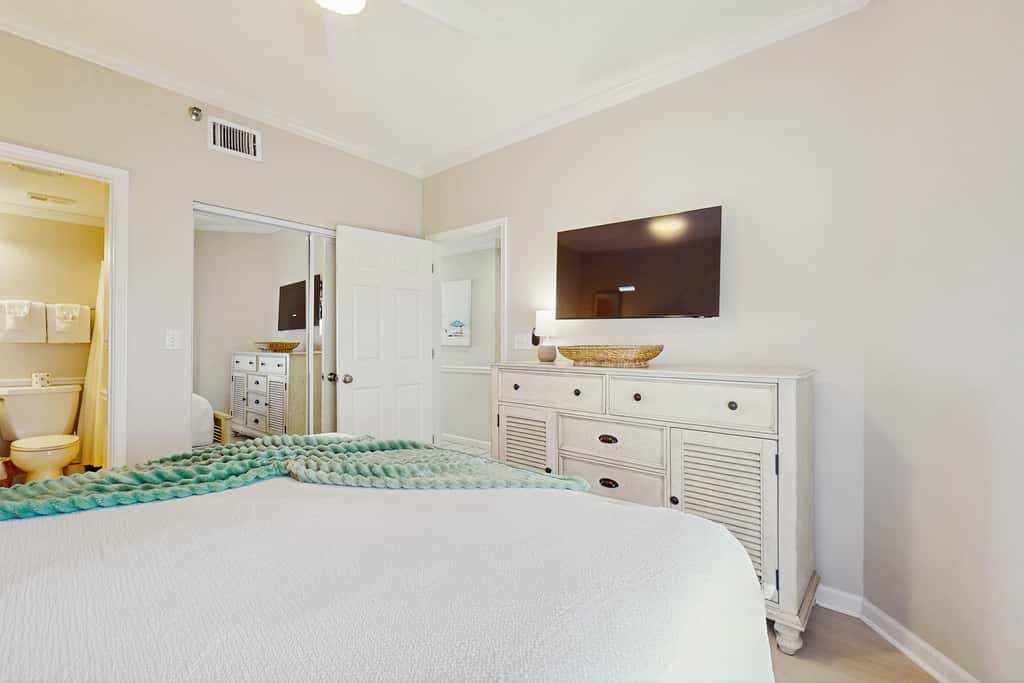 Stunning waterfront home with convenient beach access, pool & gym