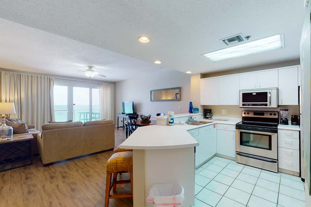 Gorgeous beach view home with balcony, pool & fitness room