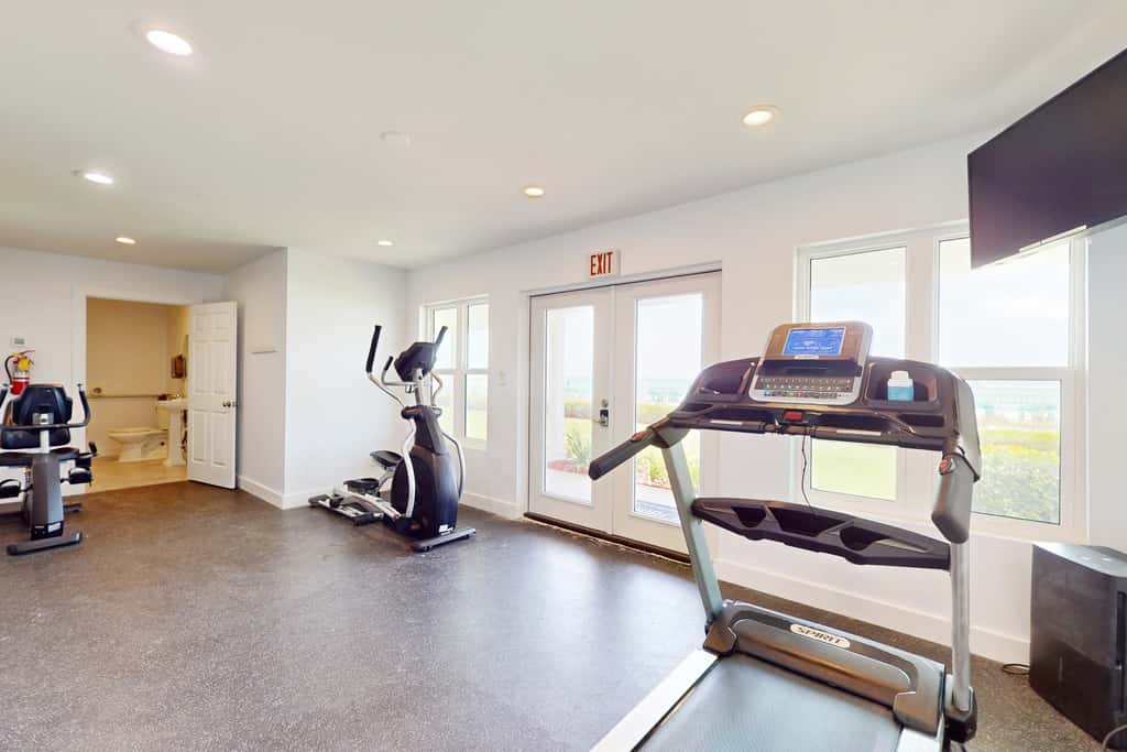 Gorgeous beach view home with balcony, pool & fitness room
