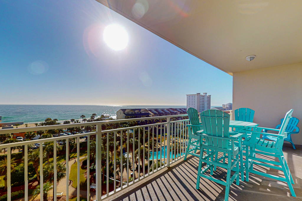 Inviting & sleek condo w private balcony, shared pool, grill & fitness center