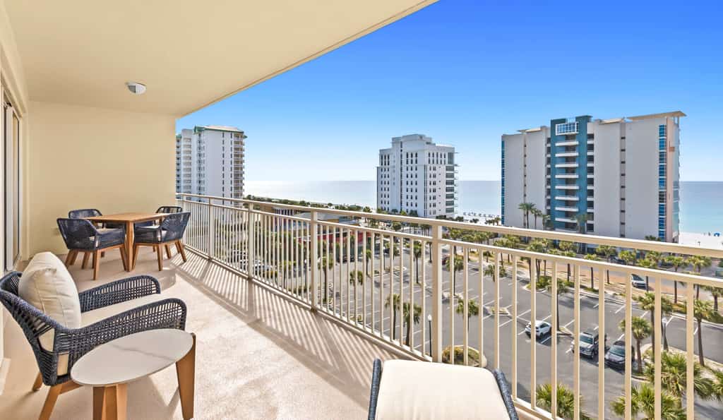 Bright beach condo with water views & private balcony - pool, gym & beach