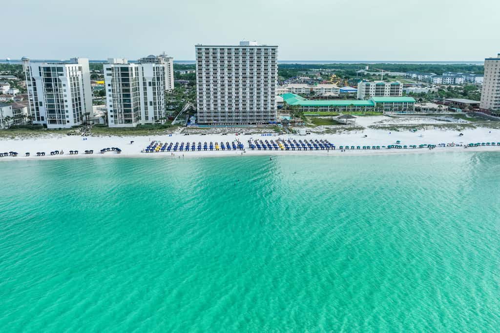 5th-floor condo with patio, pool & ocean views