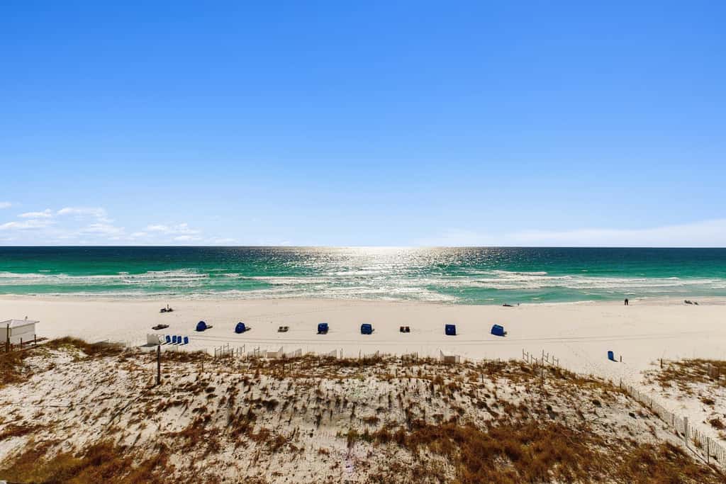 5th-floor condo with patio, pool & ocean views