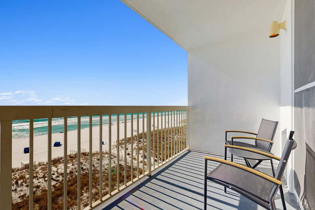5th-floor condo with patio, pool & ocean views