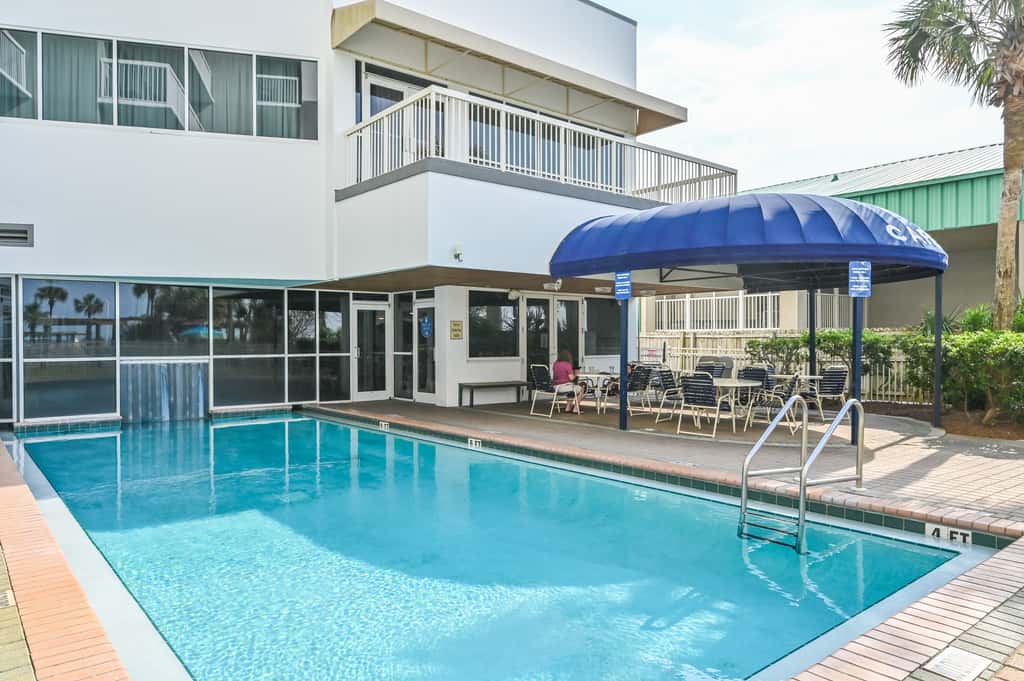 5th-floor condo with patio, pool & ocean views