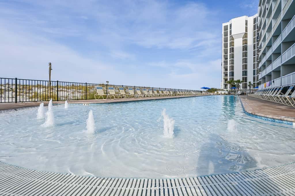 5th-floor condo with patio, pool & ocean views