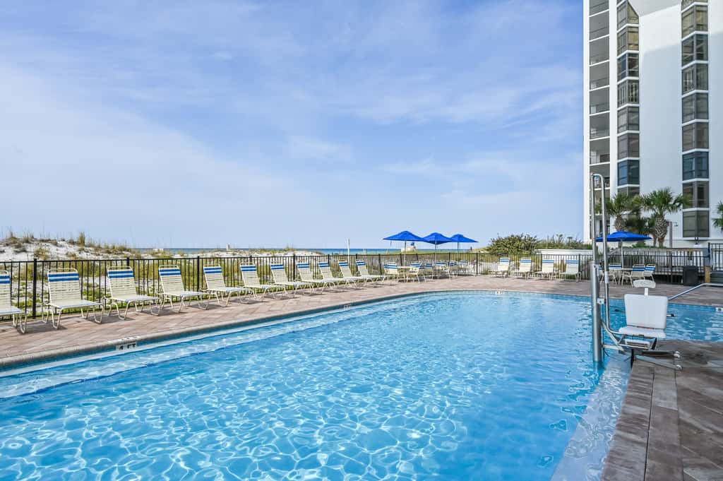 5th-floor condo with patio, pool & ocean views