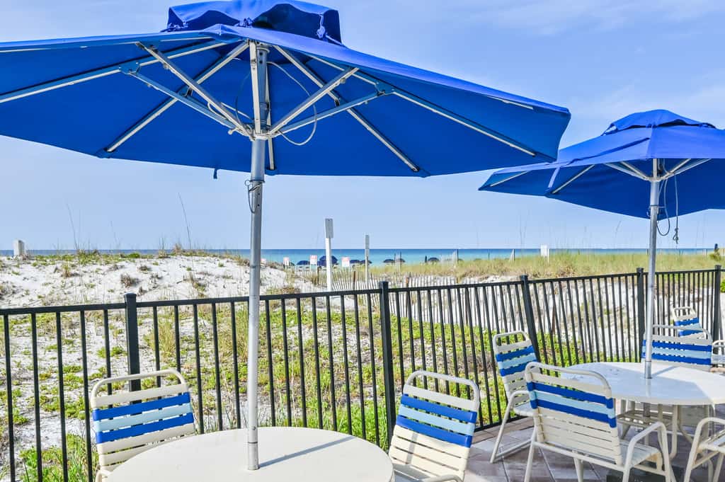 5th-floor condo with patio, pool & ocean views