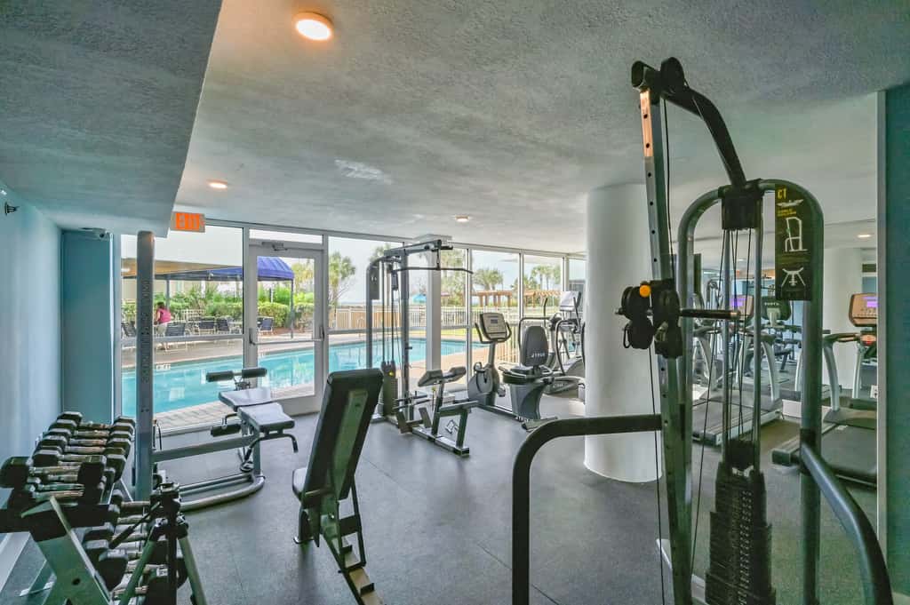 5th-floor condo with patio, pool & ocean views
