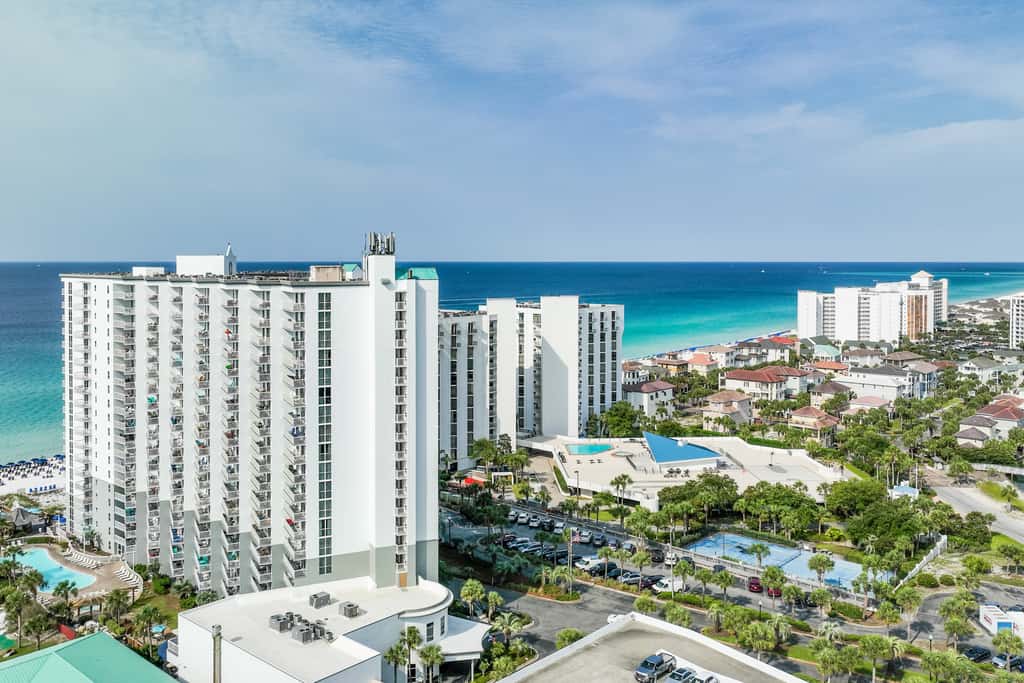 5th-floor condo with patio, pool & ocean views