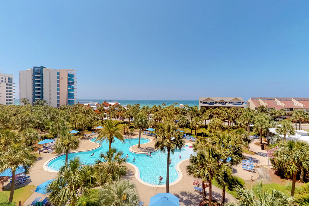 Waterfront resort condo w a shared, heated pool, fitness room, & theater