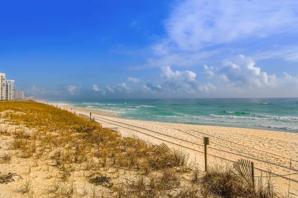 Lovely Beach Front condo with balcony, shared pool & hot tub, & free WiFi