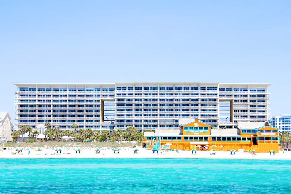 Beachfront condo w private balcony, Gulf views & on-site shared amenities