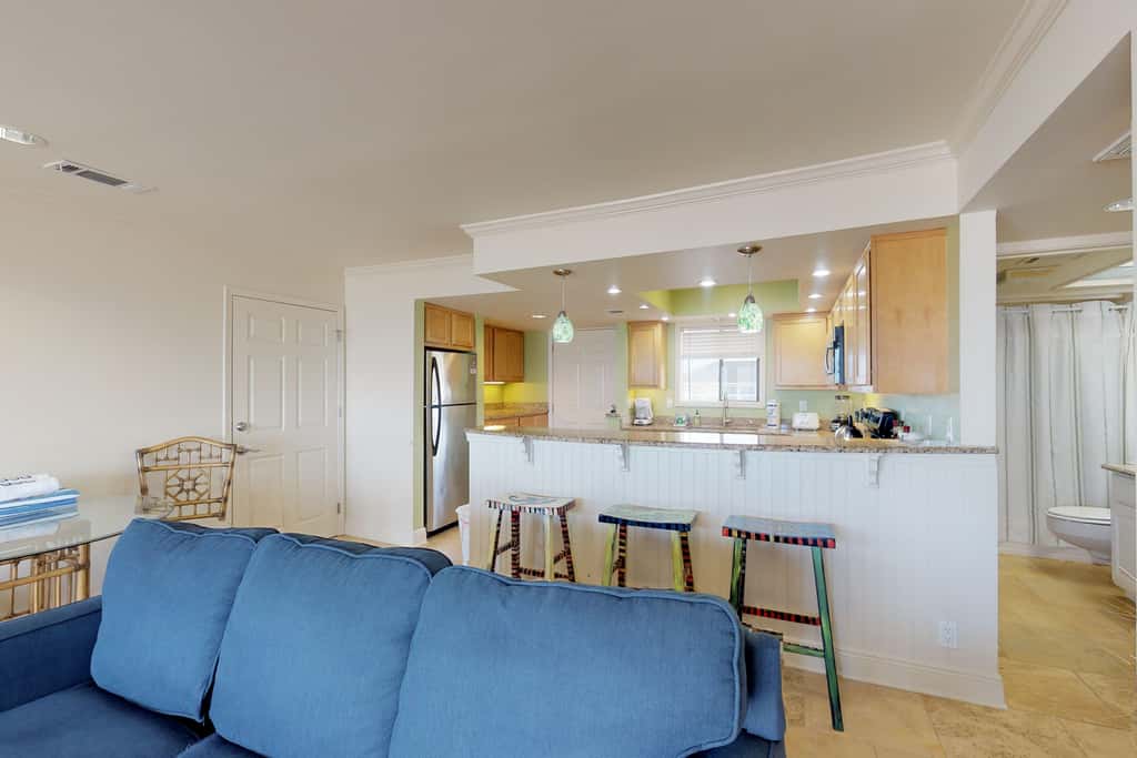 Beachfront condo with shared pool, hot tub, & fitness center plus beach access