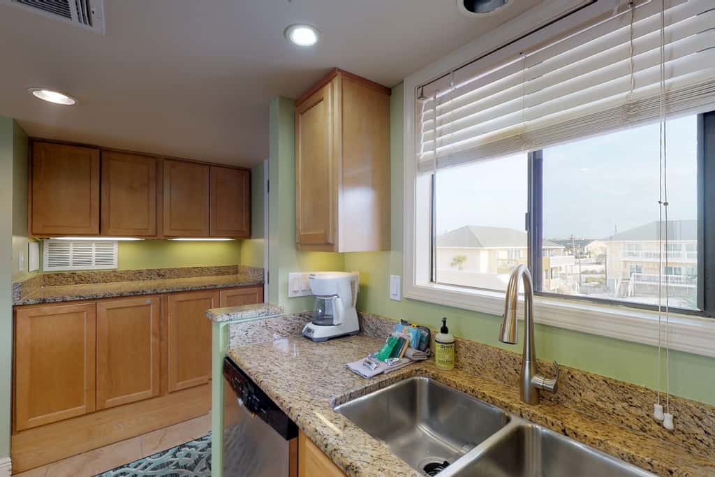 Beachfront condo with shared pool, hot tub, & fitness center plus beach access