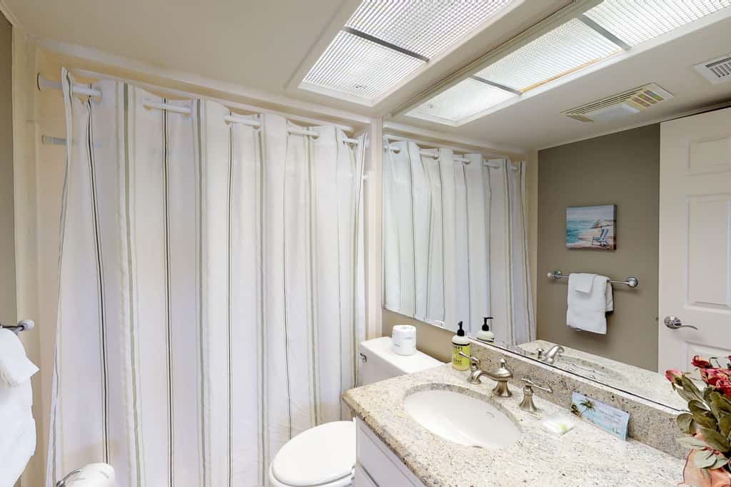 Beachfront condo with shared pool, hot tub, & fitness center plus beach access