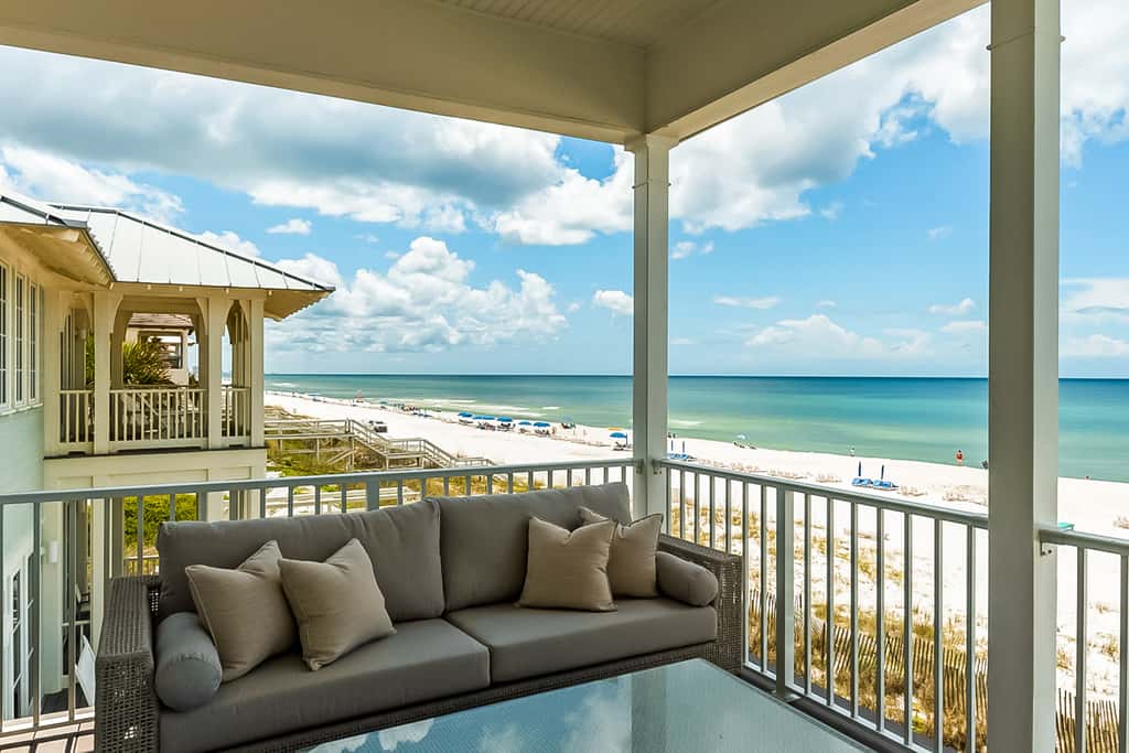 Spacious Gulf-front getaway with beach access, balcony views, a pool, & more