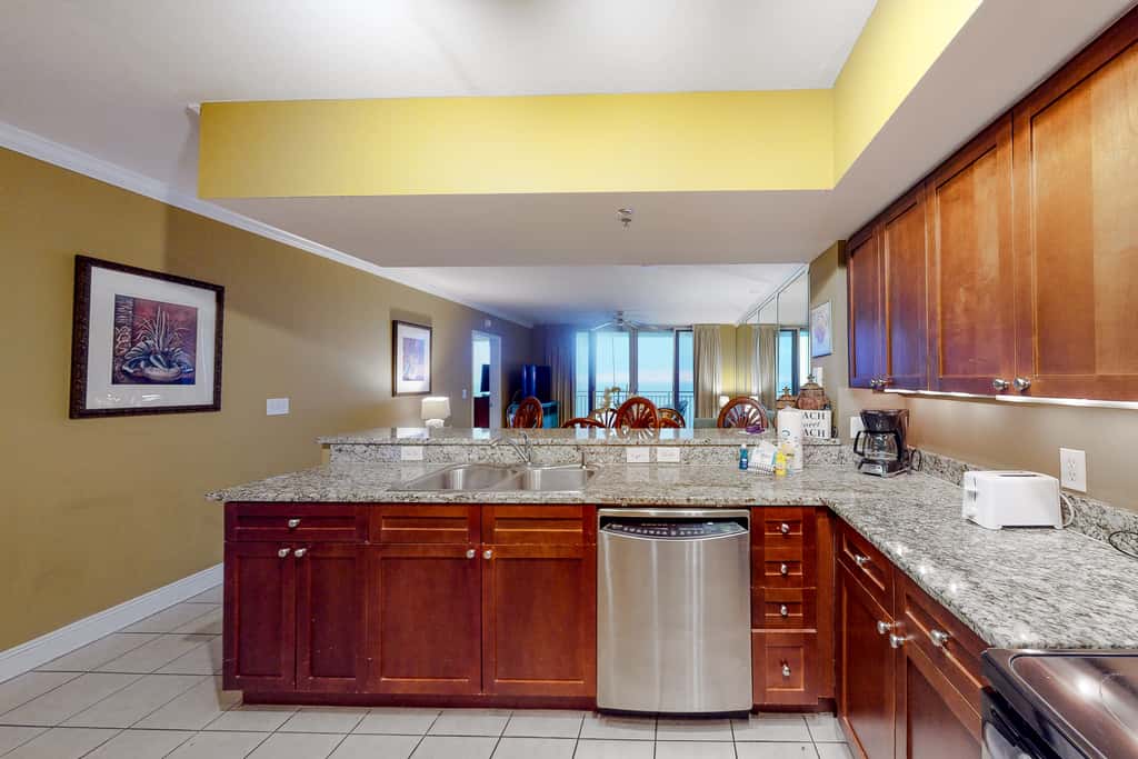 Beachfront resort condo with gulf views, pools,splash pad, hot tub, & gym