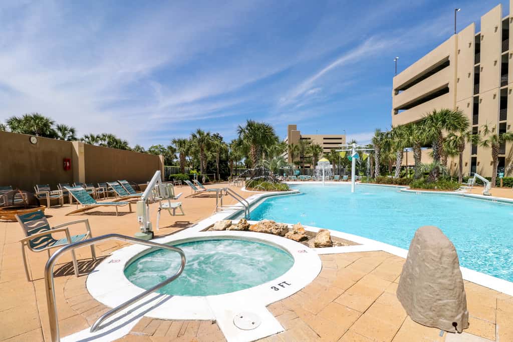 Beachfront resort condo with gulf views, pools,splash pad, hot tub, & gym