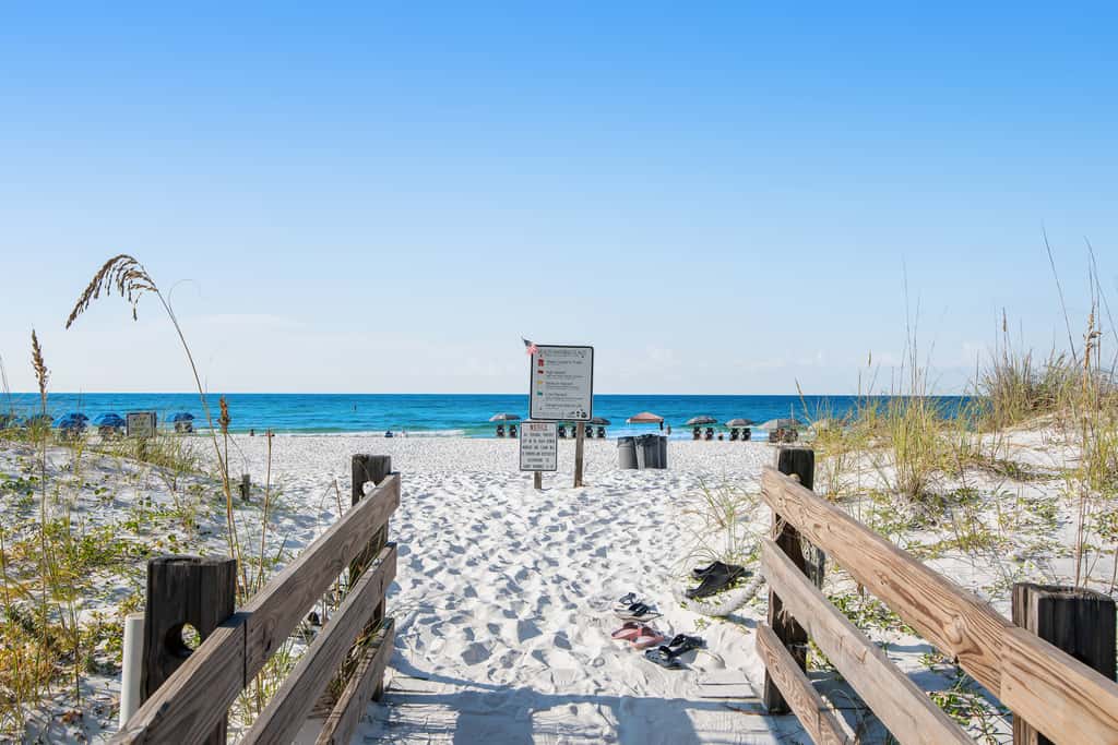 Beachfront resort condo with gulf views, pools,splash pad, hot tub, & gym