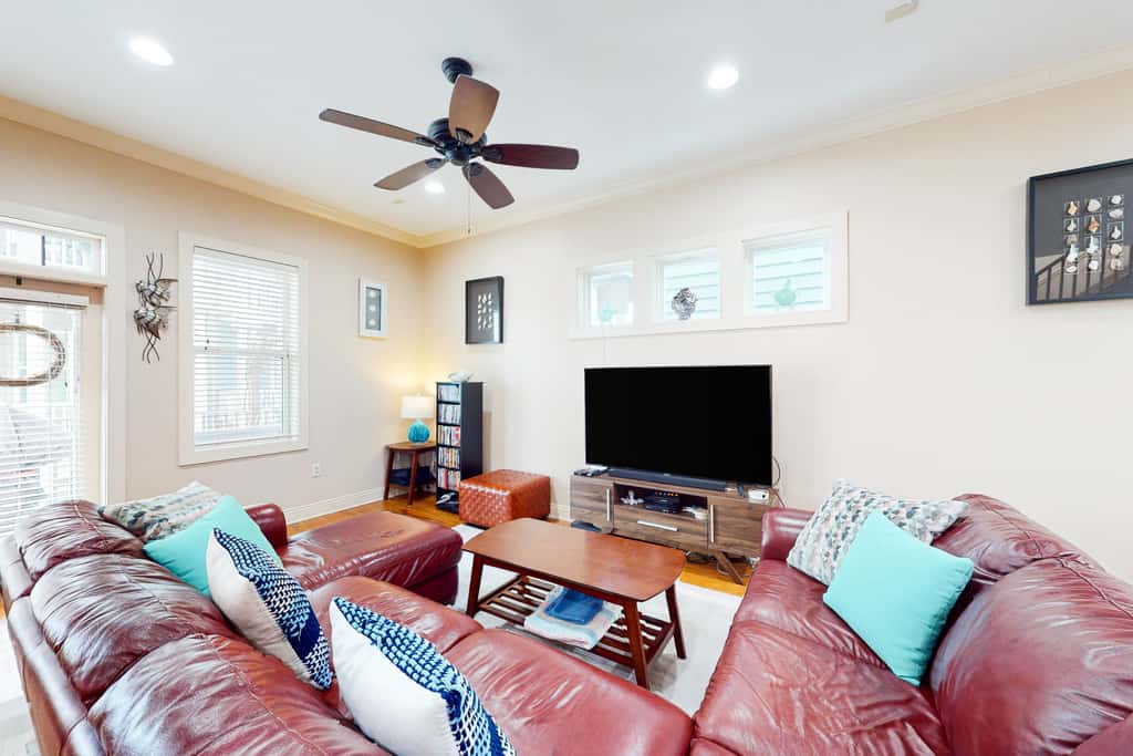 Dog-friendly home with balconies, foosball, pool access, & W&D - steps to beach