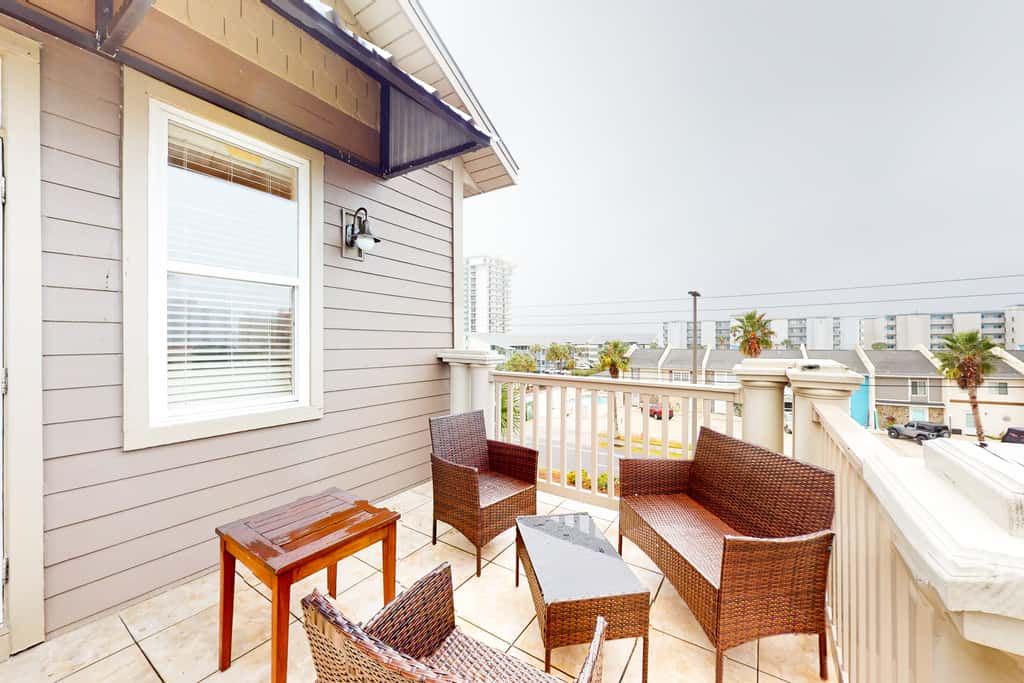 Dog-friendly home with balconies, foosball, pool access, & W&D - steps to beach