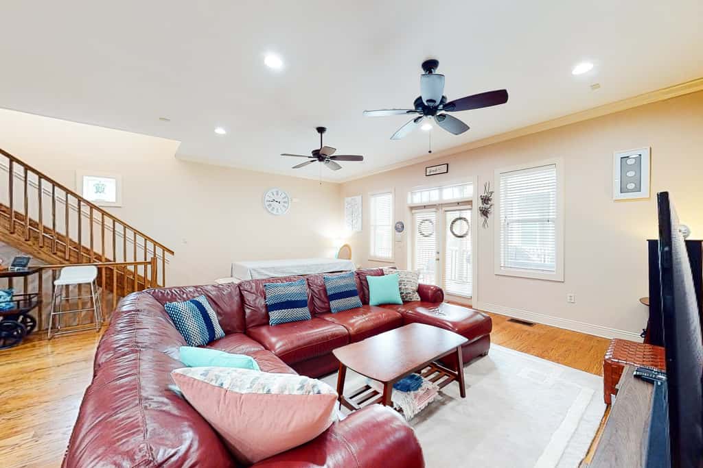 Dog-friendly home with balconies, foosball, pool access, & W&D - steps to beach