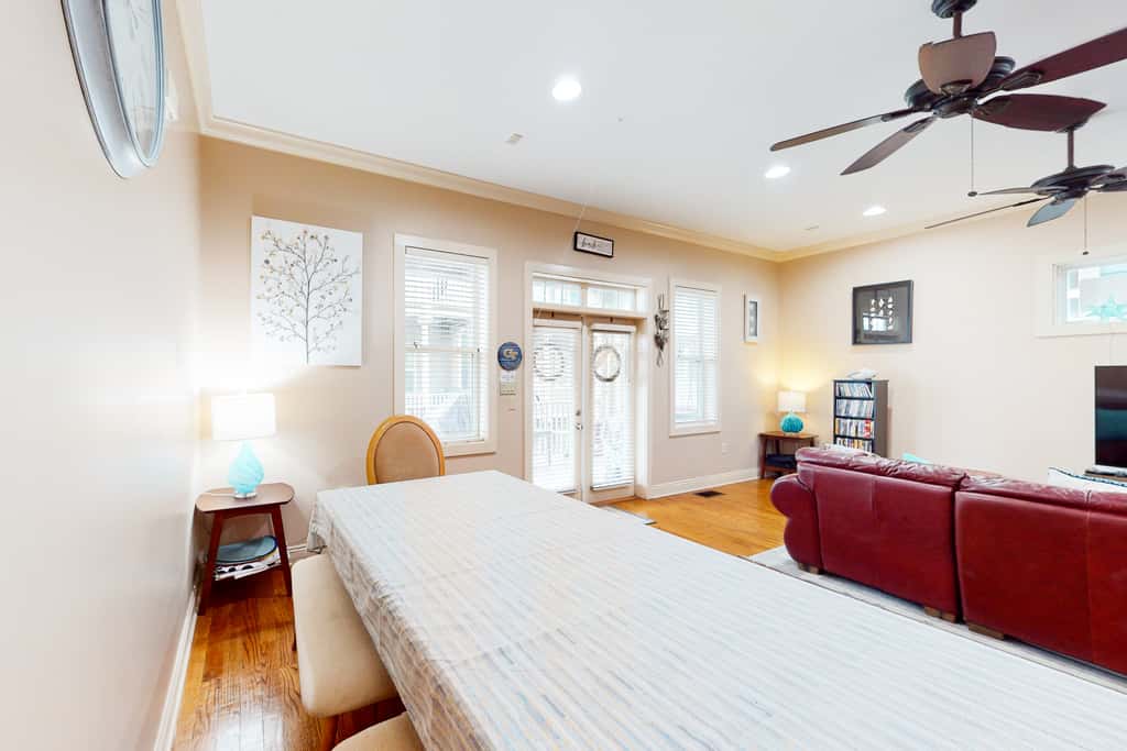 Dog-friendly home with balconies, foosball, pool access, & W&D - steps to beach