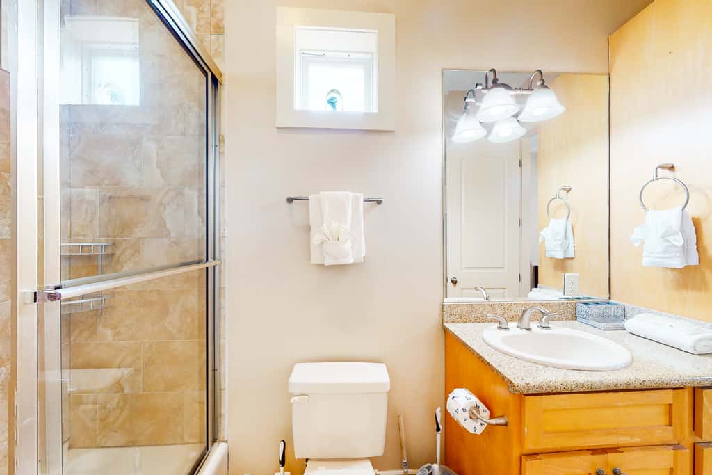 Dog-friendly home with balconies, foosball, pool access, & W&D - steps to beach