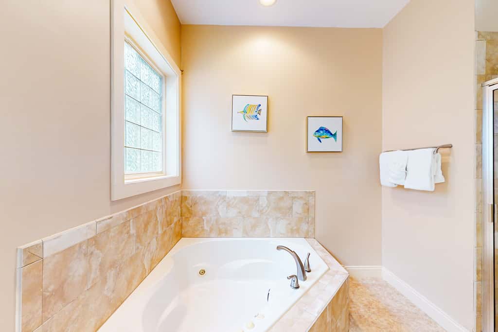 Dog-friendly home with balconies, foosball, pool access, & W&D - steps to beach