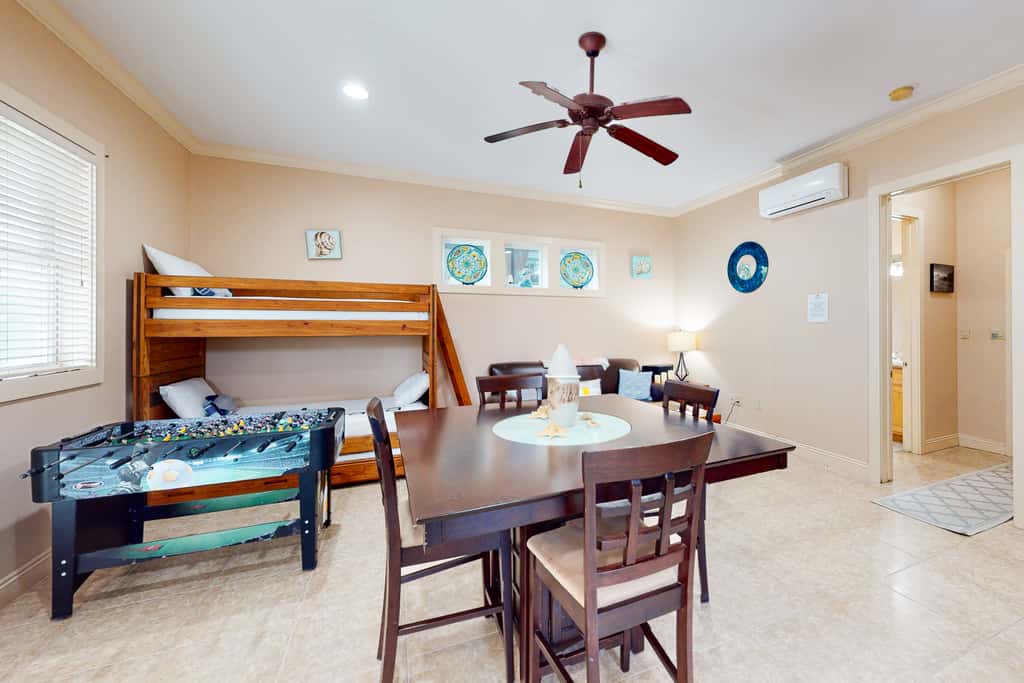 Dog-friendly home with balconies, foosball, pool access, & W&D - steps to beach