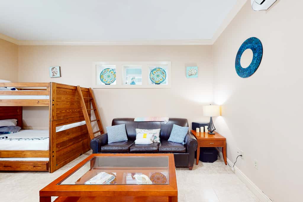 Dog-friendly home with balconies, foosball, pool access, & W&D - steps to beach