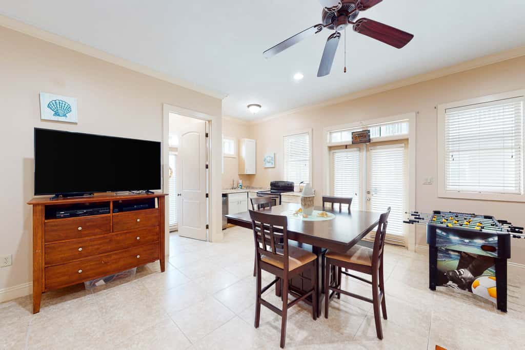 Dog-friendly home with balconies, foosball, pool access, & W&D - steps to beach