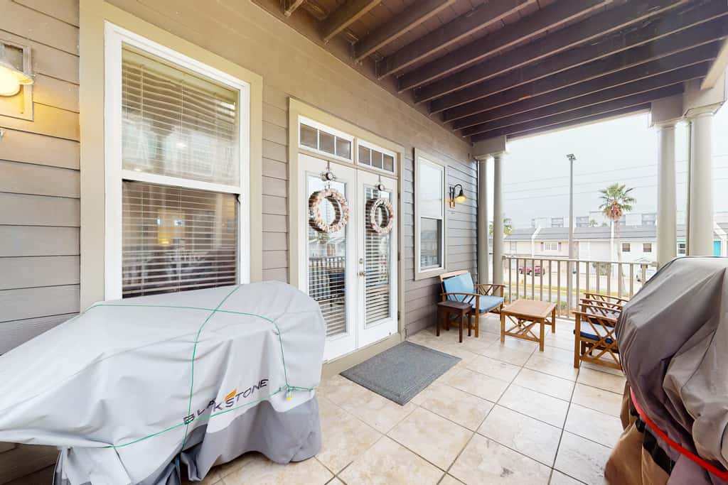 Dog-friendly home with balconies, foosball, pool access, & W&D - steps to beach