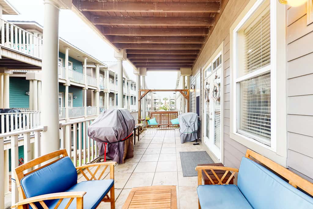 Dog-friendly home with balconies, foosball, pool access, & W&D - steps to beach