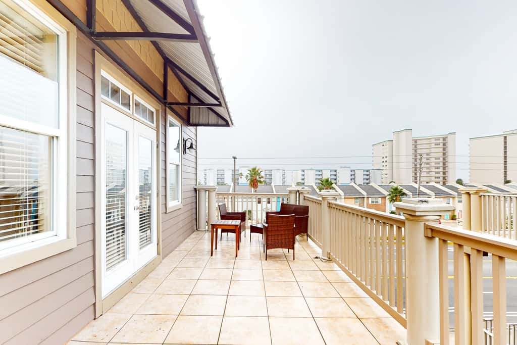 Dog-friendly home with balconies, foosball, pool access, & W&D - steps to beach