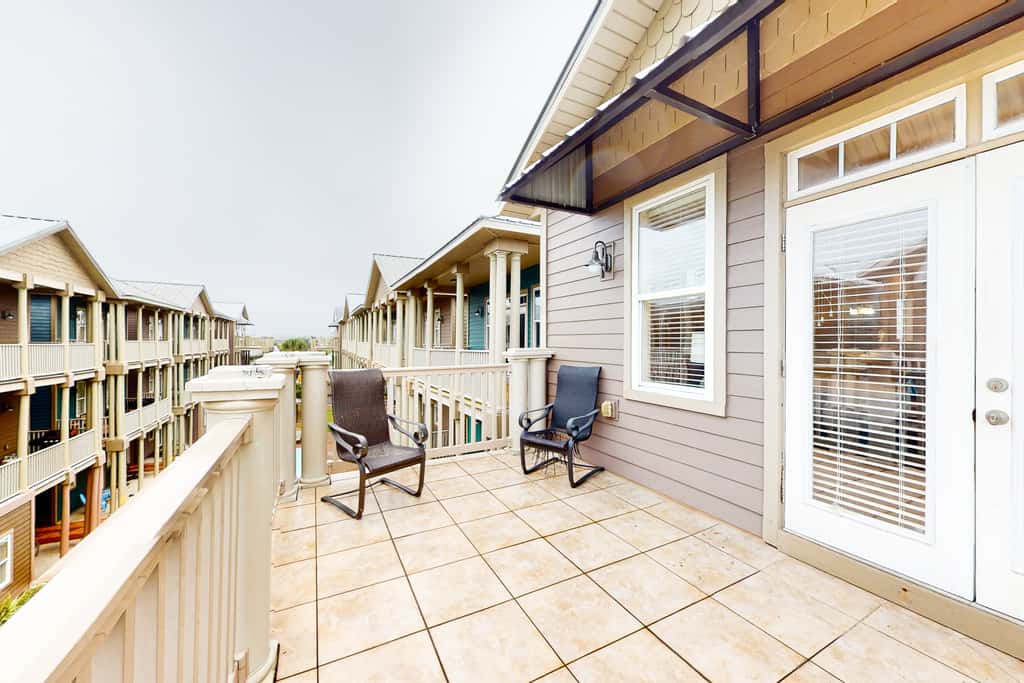 Dog-friendly home with balconies, foosball, pool access, & W&D - steps to beach