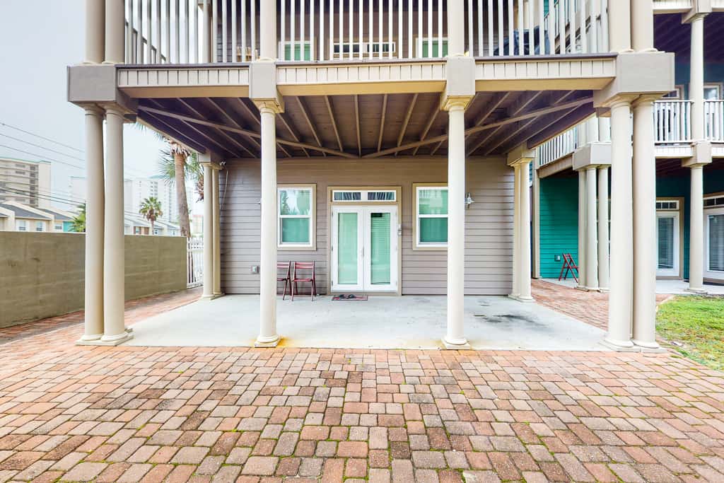 Dog-friendly home with balconies, foosball, pool access, & W&D - steps to beach