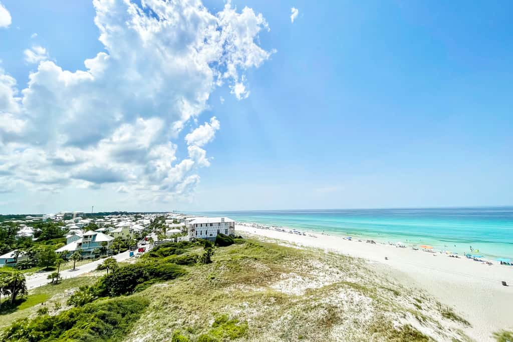 Beachfront condo in gated resort with pools, lake access, fast WiFi & patio
