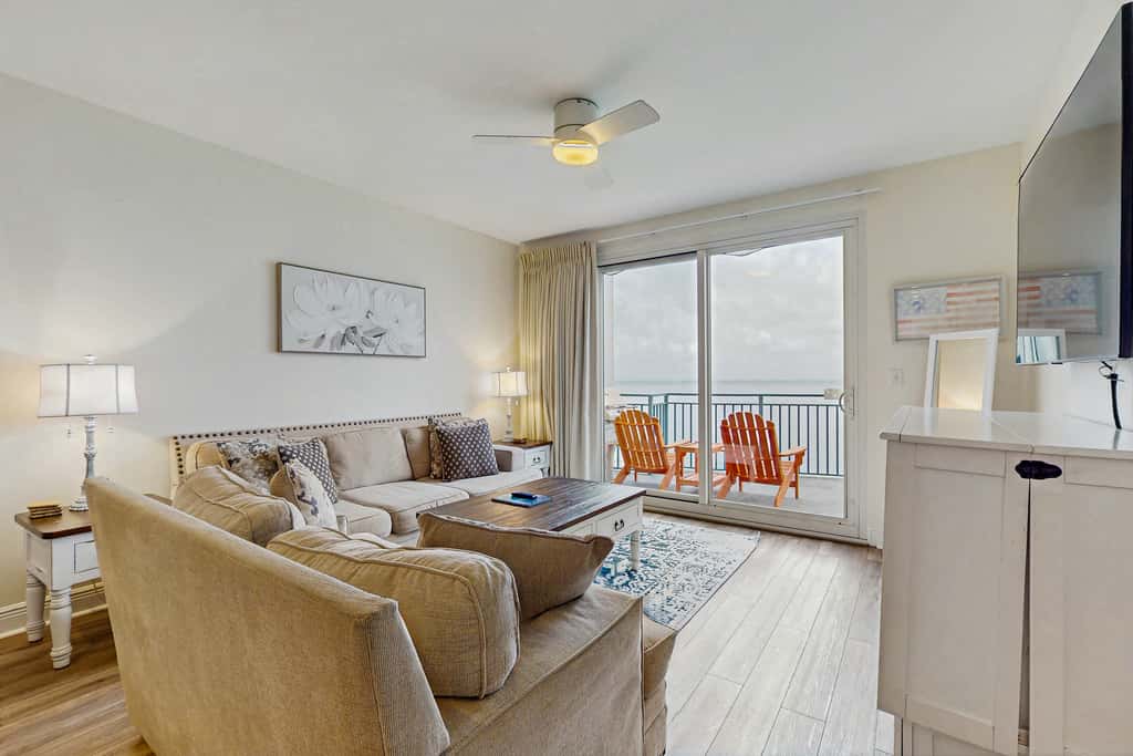 Updated beachfront retreat with hot tub, outdoor pool & balcony