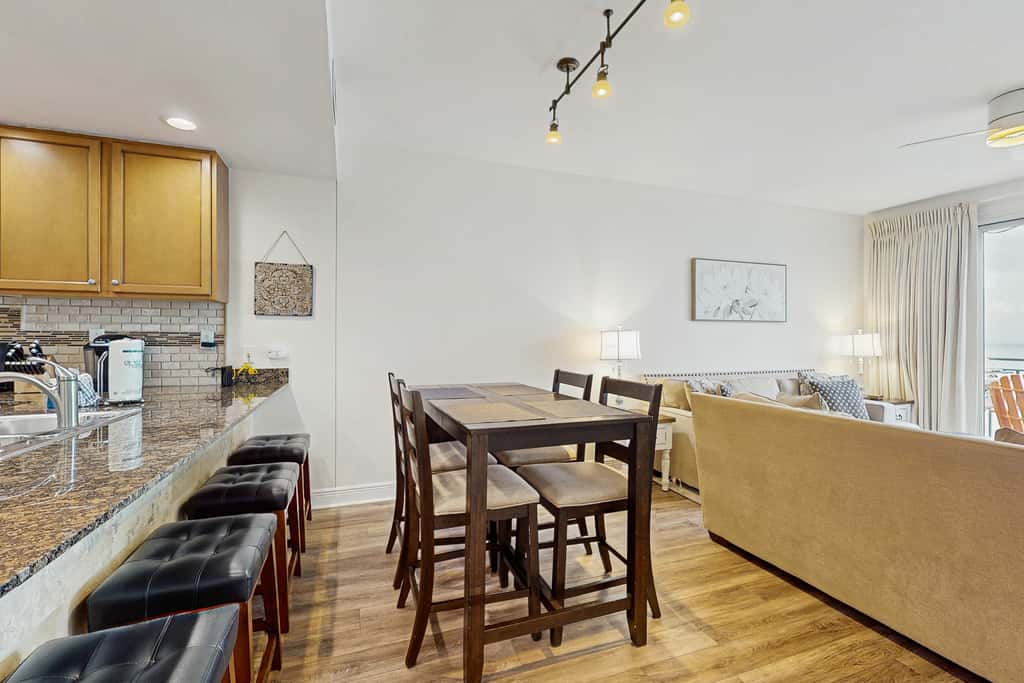 Updated beachfront retreat with hot tub, outdoor pool & balcony